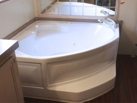 White bathtub restored by Duraglaze Bathroom Refinishing